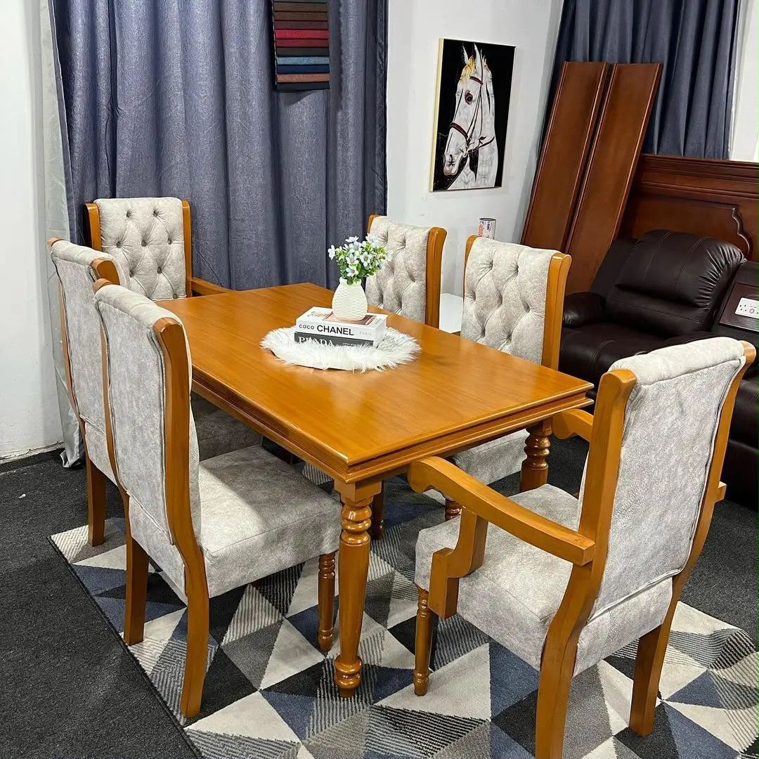 Six-seat dining set with tufted chairs