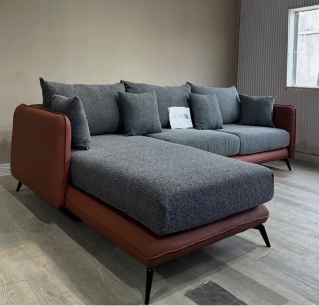 L-shaped sectional sofa in grey and terracotta