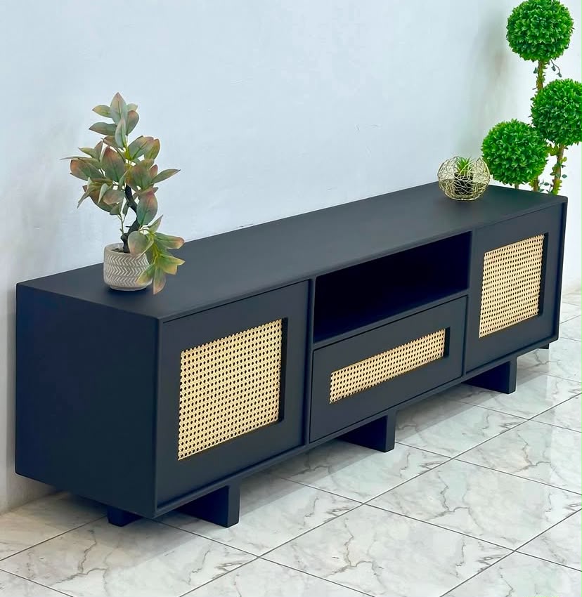 Black storage unit with rattan cane panels